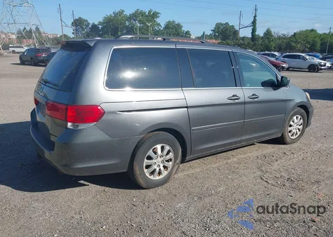 2010 Honda Odyssey Exl z USA, uszkodzony, nr VIN 5FNRL3H65AB114099